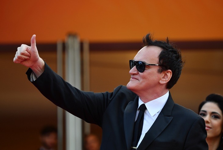 US film director Quentin Tarantino gives a thumbs-up as he arrives for the screening of the film "Once Upon a Time... in Hollywood" at the 72nd edition of the Cannes Film Festival in Cannes, southern France, on May 21, 2019. (Photo by Alberto PIZZOLI / AFP)